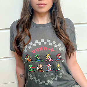 Classic 1992 pixel vibes with our Pixel Racer tee, worn by the awesome  @_cute_and_nerdy