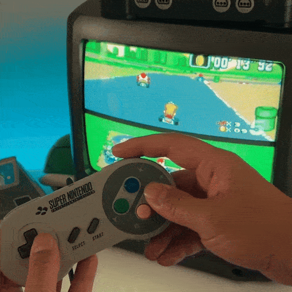 A gif image of Super Mario Kart on the SNES